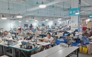 Woven garment sewing workshop at Guangzhou custom clothing factory